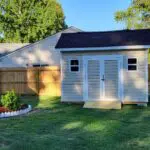 Outdoor garden shed with lawn