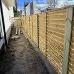 Wooden fence construction backyard upgrade