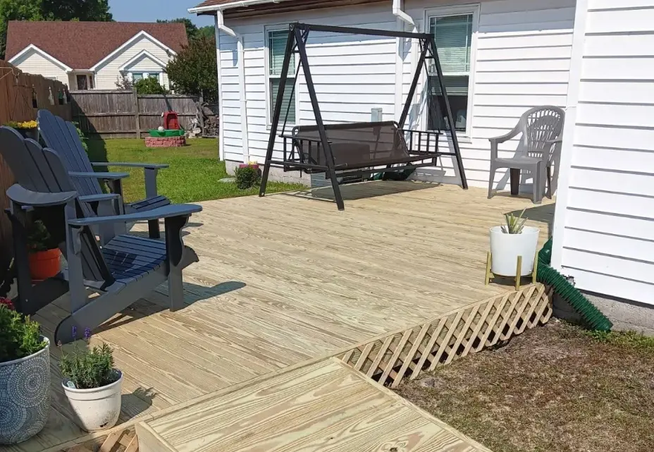 Backyard wooden deck with seating