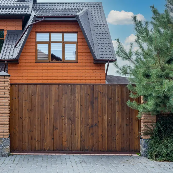 Modern home with wooden gate