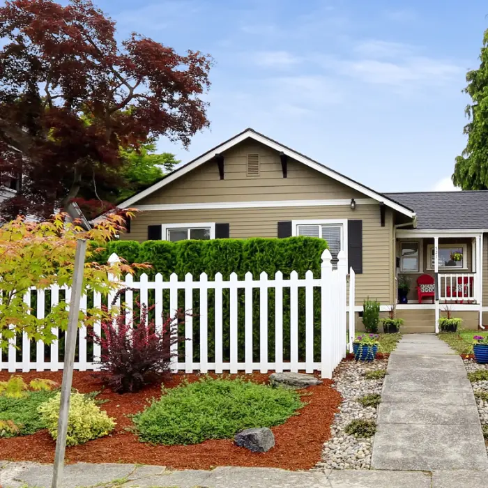 Cozy home with white fence