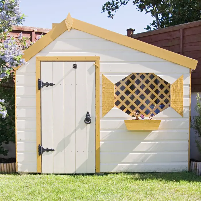 Garden shed with decorative window