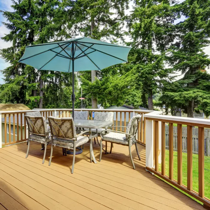 Outdoor deck furniture with umbrella