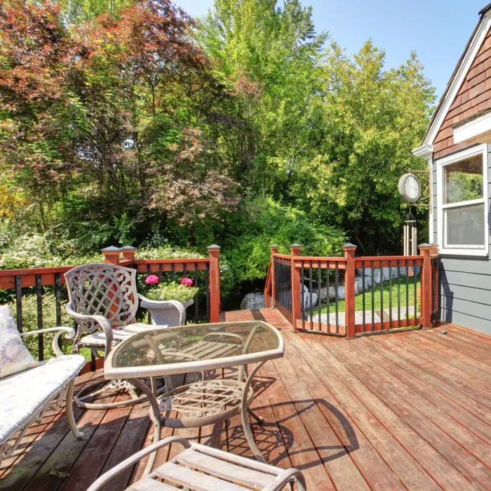 Sunny backyard wooden deck furniture