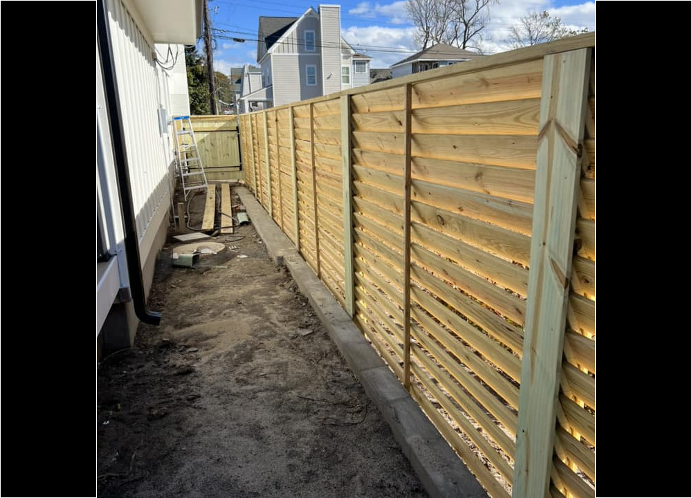 Wooden fence construction backyard upgrade
