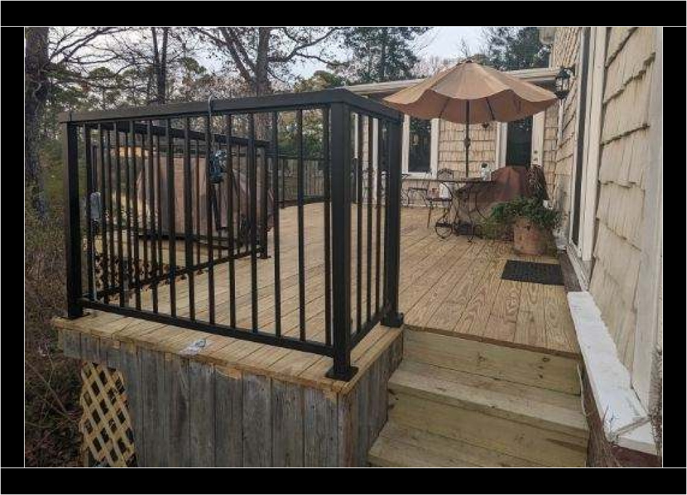 Outdoor deck with metal railing
